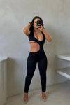 Black Cut Out Asymmetric Sleeveless Jumpsuit